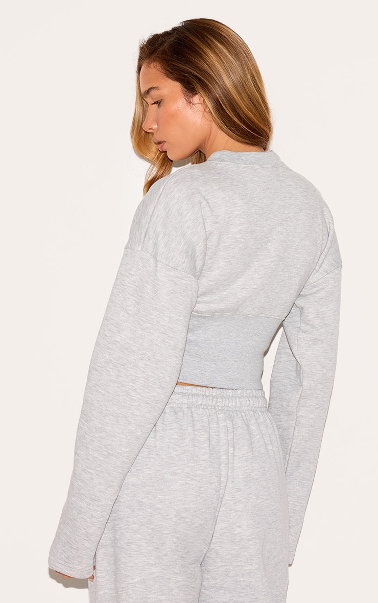 https://cdn-img.prettylittlething.com/0/e/0/a/0e0ad927a71f5d111a800f3595dc18b64ad536e3_CNL9671_2_ash_grey_extreme_cinched_waist_sweatshirt.jpg