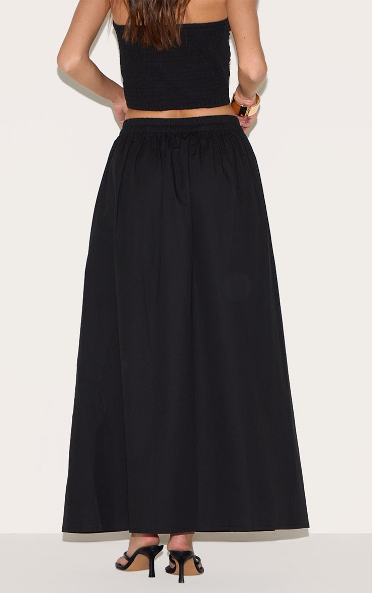 https://cdn-img.prettylittlething.com/1/a/6/f/1a6f61dbbab9e851d3391a4ba5a24631c6164281_CNM3953_3_black_cotton_poplin_a_line_low_rise_maxi_skirt.jpg