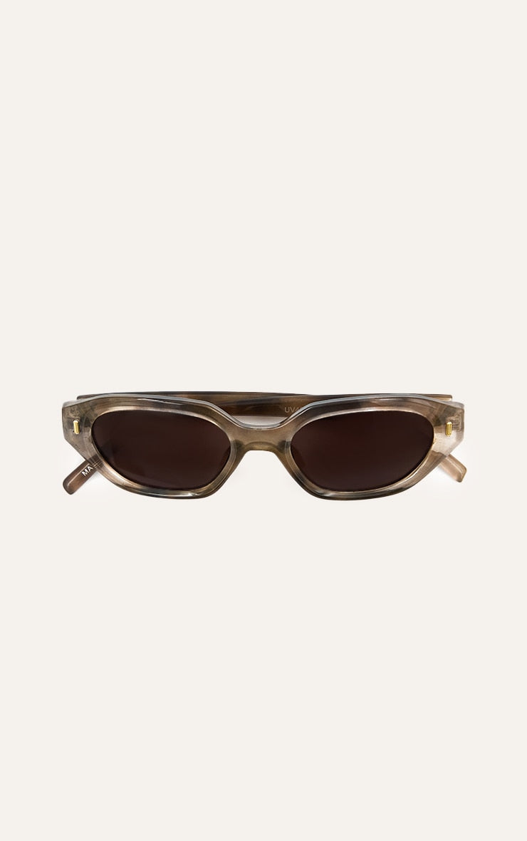 https://cdn-img.prettylittlething.com/1/e/2/3/1e232f7fd0c91461ea6fc8544d71081db047d8b3_CNM9165_2_brown_brown_acrylic_cat_eye_sunglasses.jpg