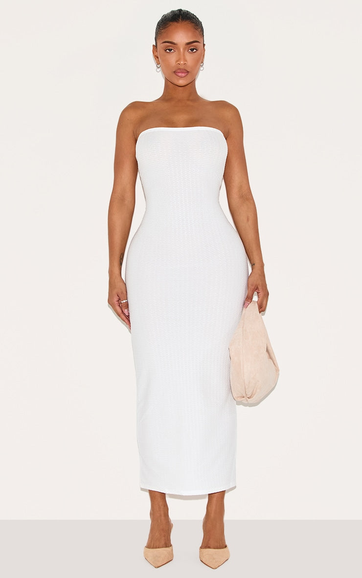https://cdn-img.prettylittlething.com/2/3/1/0/23109ff8e689165e01b54955f96dd0b6e29b5653_CNA2346_1_shape_white_textured_bandeau_midaxi_dress.jpg