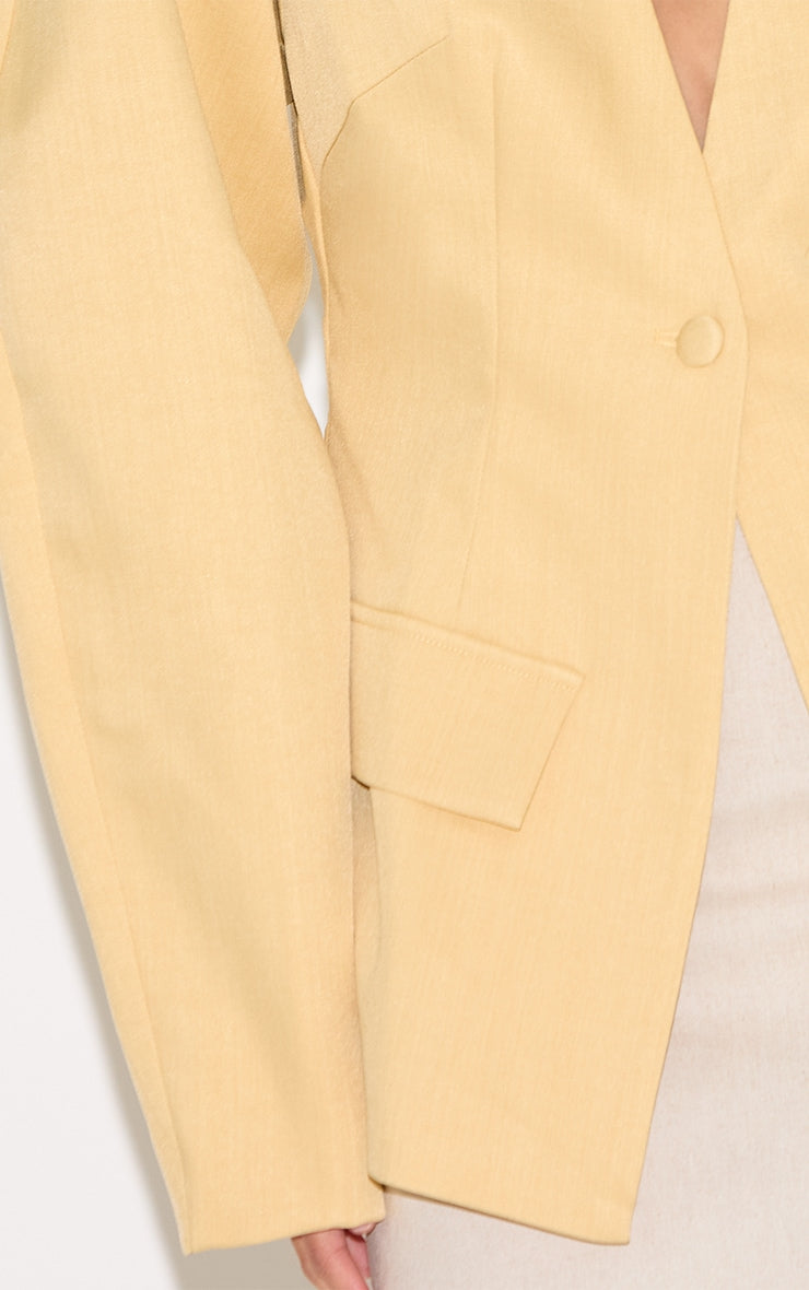https://cdn-img.prettylittlething.com/4/d/e/1/4de17af9d289f2c30c826da6797f96f987c64ba2_CNM1408_4_butter_yellow_cocoon_sleeve_cinched_waist_pocket_blazer.jpg