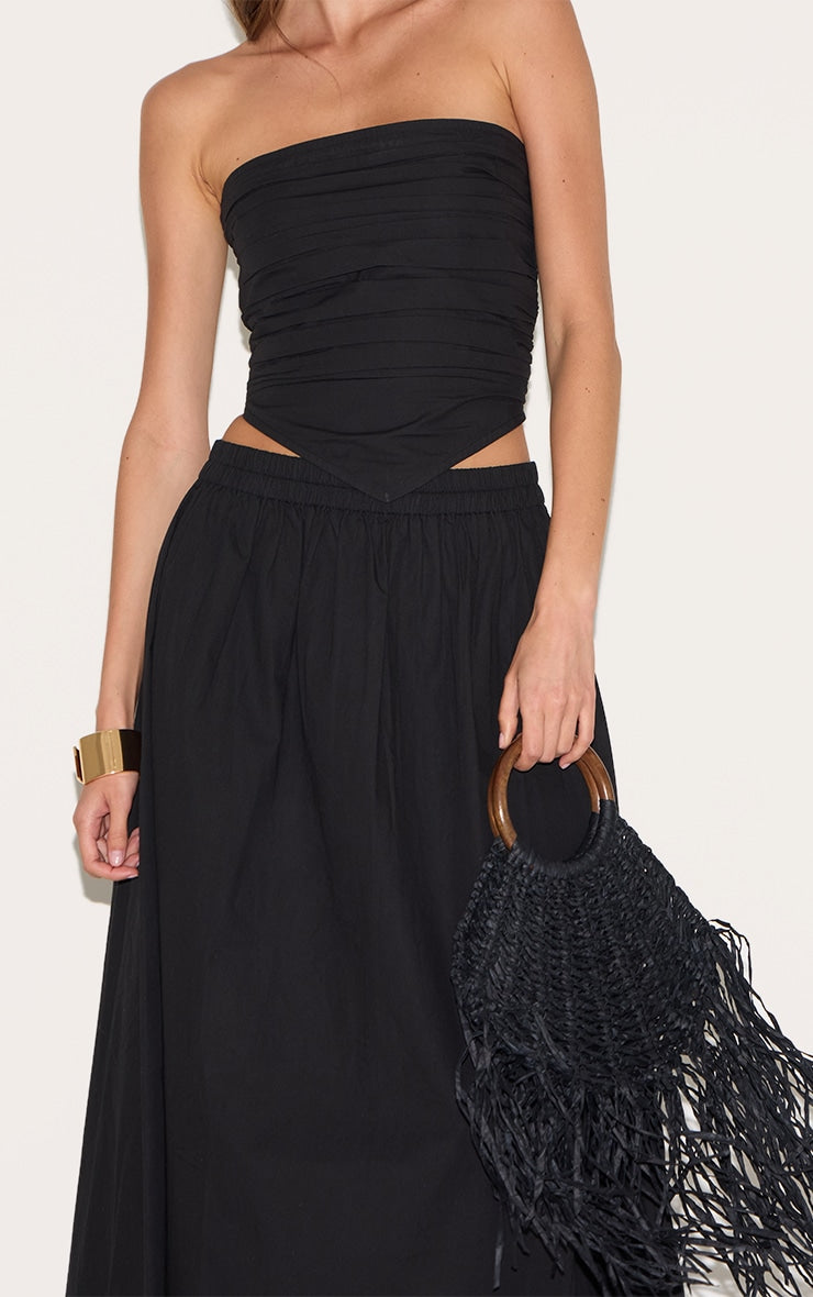 https://cdn-img.prettylittlething.com/4/f/8/4/4f8461c792fd67daf1bd8827038420af6c644472_CNM3953_4_black_cotton_poplin_a_line_low_rise_maxi_skirt.jpg