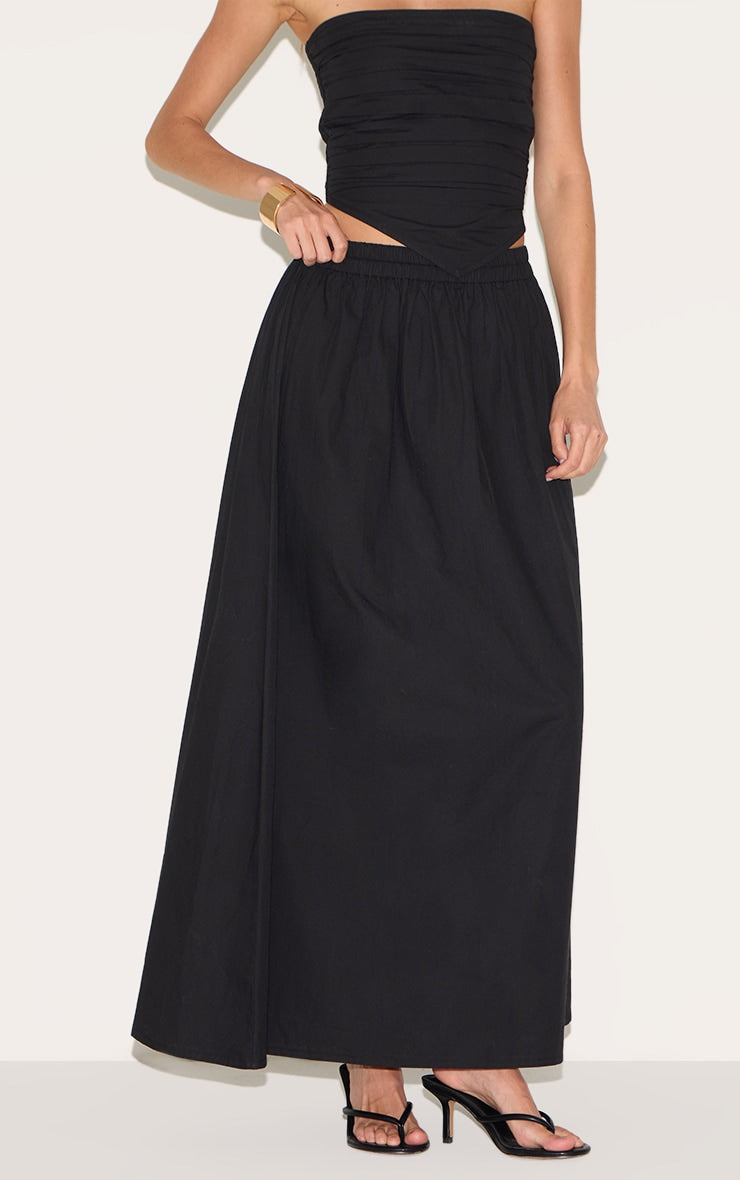 https://cdn-img.prettylittlething.com/c/c/9/c/cc9c243eb2db6850acd0ff9584ab029daac53f91_CNM3953_2_black_cotton_poplin_a_line_low_rise_maxi_skirt.jpg