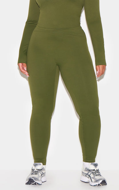 https://cdn-img.prettylittlething.com/0/6/f/6/06f67a930e2bb40f92e4ec8bf1b1098c118013e1_CNL7809_7_forest_green_sculpt_super_high_waist_leggings.jpg