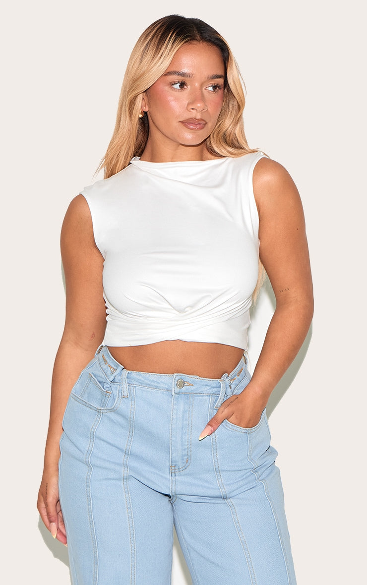 https://cdn-img.prettylittlething.com/1/1/4/8/1148530943bf0e6081c29487b927161e1de62064_CNM8576_1_shape_white_super_soft_off_shoulder_twist_front_top.jpg