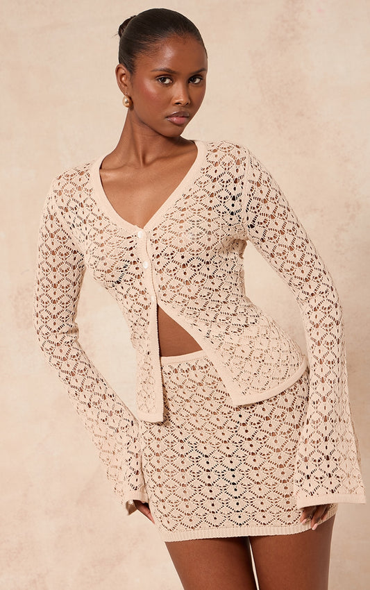 https://cdn-img.prettylittlething.com/1/4/f/3/14f3e062cbbe4f923d5f63e8184dd55557410d38_CNL8183_1_oatmeal_crochet_mini_skirt.jpg