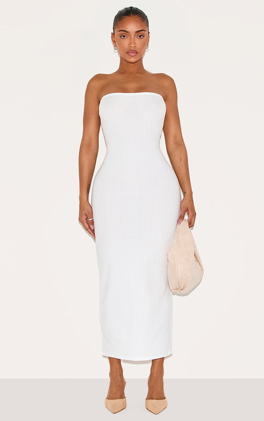 https://cdn-img.prettylittlething.com/2/3/1/0/23109ff8e689165e01b54955f96dd0b6e29b5653_CNA2346_1_shape_white_textured_bandeau_midaxi_dress.jpg