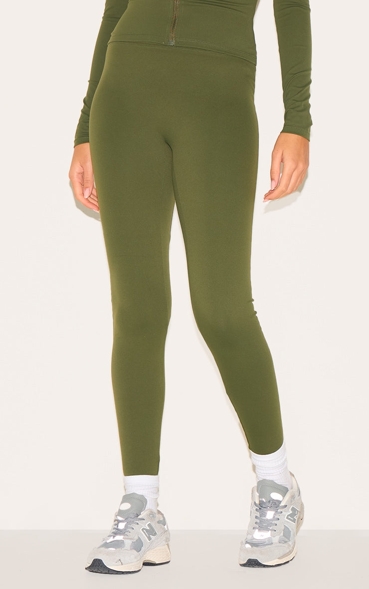 https://cdn-img.prettylittlething.com/3/8/1/8/3818cead41046b3286e6eb43556aa18b40bff226_CNL7809_2_forest_green_sculpt_super_high_waist_leggings.jpg