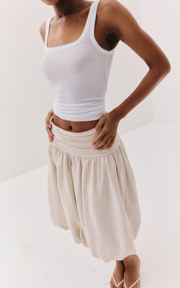 https://cdn-img.prettylittlething.com/4/6/0/5/4605db51a02a8f65cbeb396febfc89ba580e8911_CNM3751_4_white_sheer_soft_touch_scoop_neck_long_vest_top.jpg