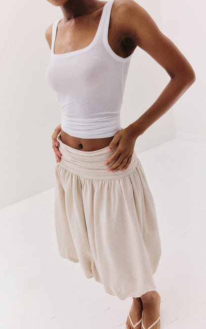 https://cdn-img.prettylittlething.com/4/6/0/5/4605db51a02a8f65cbeb396febfc89ba580e8911_CNM3751_4_white_sheer_soft_touch_scoop_neck_long_vest_top.jpg