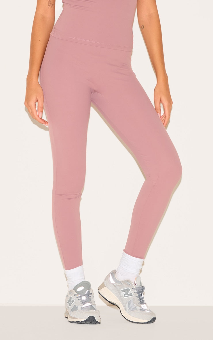 https://cdn-img.prettylittlething.com/5/3/1/9/5319dae32059751796c9c49b7f70ee52f970febb_CNL8671_2_mauve_sculpt_super_high_waist_leggings.jpg