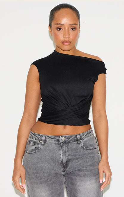 https://cdn-img.prettylittlething.com/5/b/9/8/5b980283040232efbd2f4b2121db18438ba20e97_CNM8577_4_shape_black_super_soft_off_shoulder_twist_front_top.jpg
