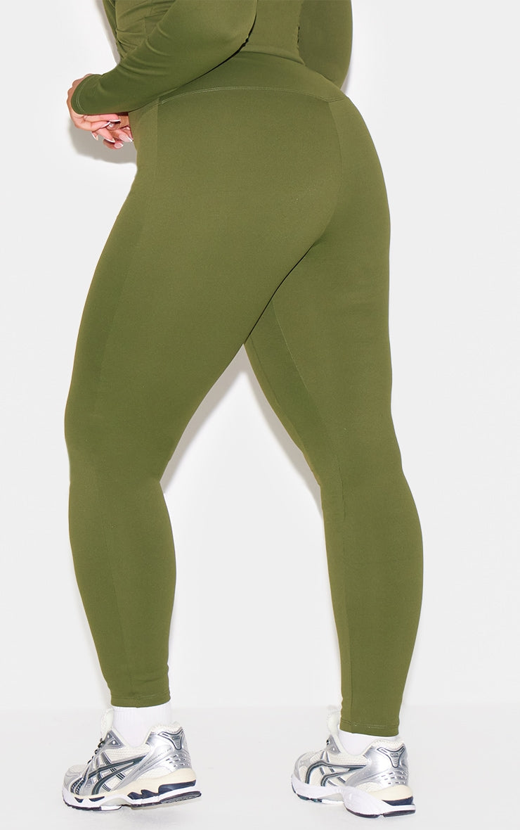 https://cdn-img.prettylittlething.com/5/e/e/f/5eef1e2715ee52615fb72cd19ae14a90c84c5620_CNL7809_8_forest_green_sculpt_super_high_waist_leggings.jpg