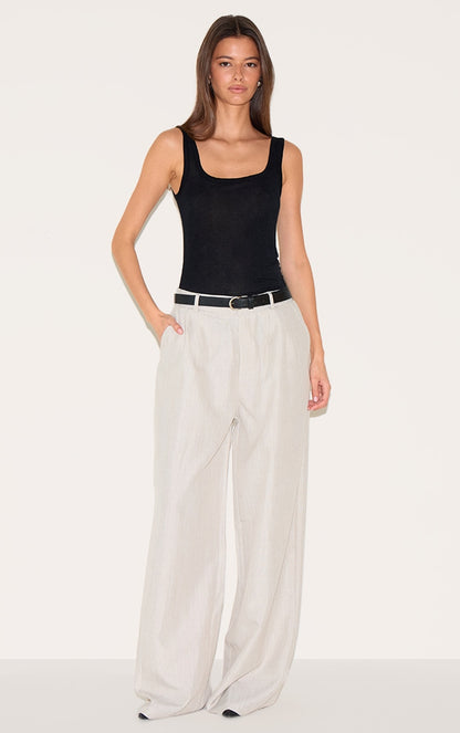 https://cdn-img.prettylittlething.com/9/5/7/0/95709d898ee2214c00bad1881f2540c74ce293cc_CNM3750_3_black_sheer_soft_touch_scoop_neck_long_vest_top.jpg