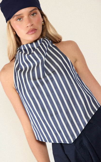 https://cdn-img.prettylittlething.com/b/2/5/7/b257f81798ec49adb1ae2903a62c8c027d0ae572_CNM5325_2_indigo_blue_cotton_look_striped_halterneck_top.jpg