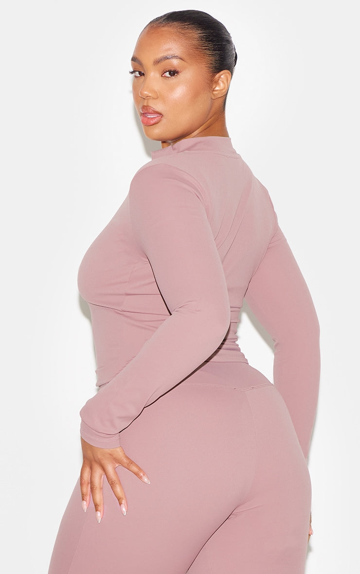 https://cdn-img.prettylittlething.com/b/7/a/f/b7af9d9864325d904b20c0e0d5144fcfb8c4a965_CNL7883_7_mauve_sculpt_jacket.jpg