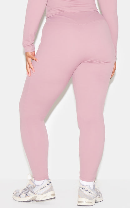 https://cdn-img.prettylittlething.com/b/e/1/9/be198634fe40f176d4cfda28e206331f97218cdd_CNL8671_8_mauve_sculpt_super_high_waist_leggings.jpg