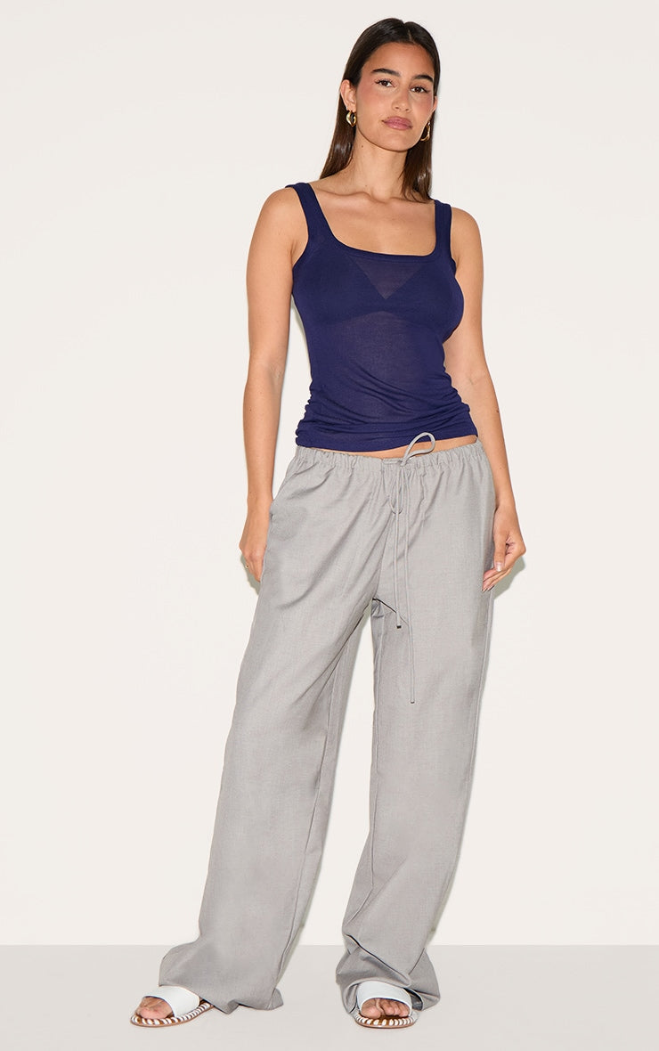 https://cdn-img.prettylittlething.com/c/0/6/d/c06d31c27f7c9b6350a3bd0073c71bc3afff4cc0_CNM3737_3_navy_sheer_soft_touch_scoop_neck_long_vest_top.jpg