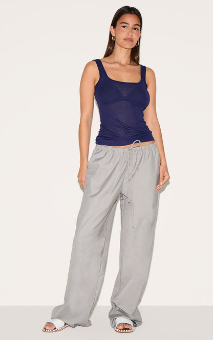 https://cdn-img.prettylittlething.com/c/0/6/d/c06d31c27f7c9b6350a3bd0073c71bc3afff4cc0_CNM3737_3_navy_sheer_soft_touch_scoop_neck_long_vest_top.jpg