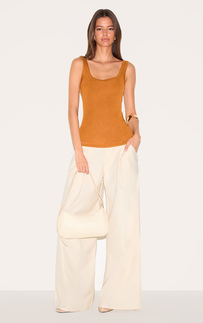 https://cdn-img.prettylittlething.com/c/4/2/8/c4282cd10f3be37a70f380b6850f612a44f3faa7_CNM3752_3_tan_sheer_soft_touch_scoop_neck_long_vest_top.jpg
