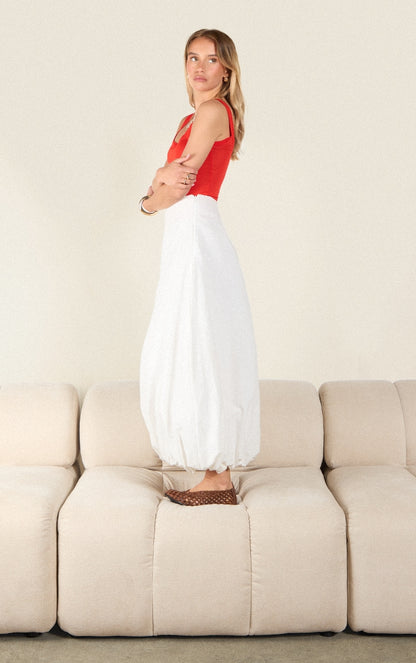 https://cdn-img.prettylittlething.com/d/c/2/1/dc21a7655e2badcb4495f8e48308e73519a79c50_CNM3738_3_red_sheer_soft_touch_scoop_neck_long_vest_top.jpg