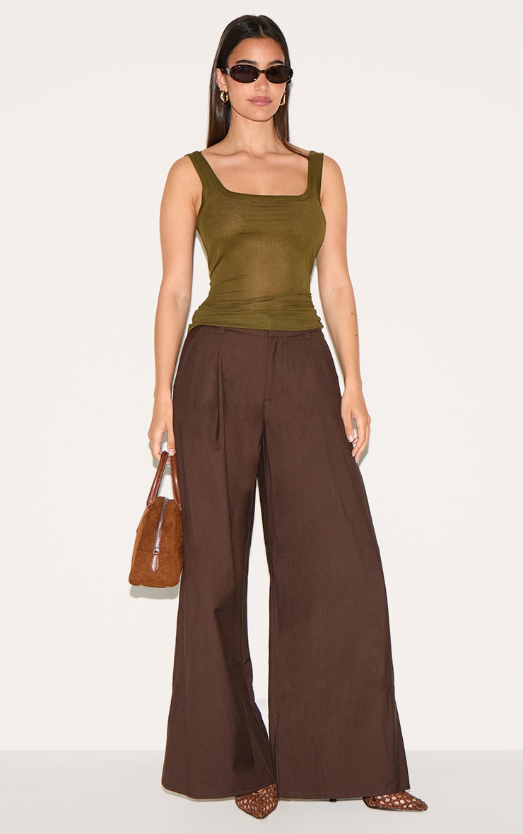 https://cdn-img.prettylittlething.com/e/3/f/4/e3f403c3dbd364aa7562e0dfd115d27dbd27c2ee_CNM3736_3_olive_sheer_soft_touch_scoop_neck_long_vest_top.jpg