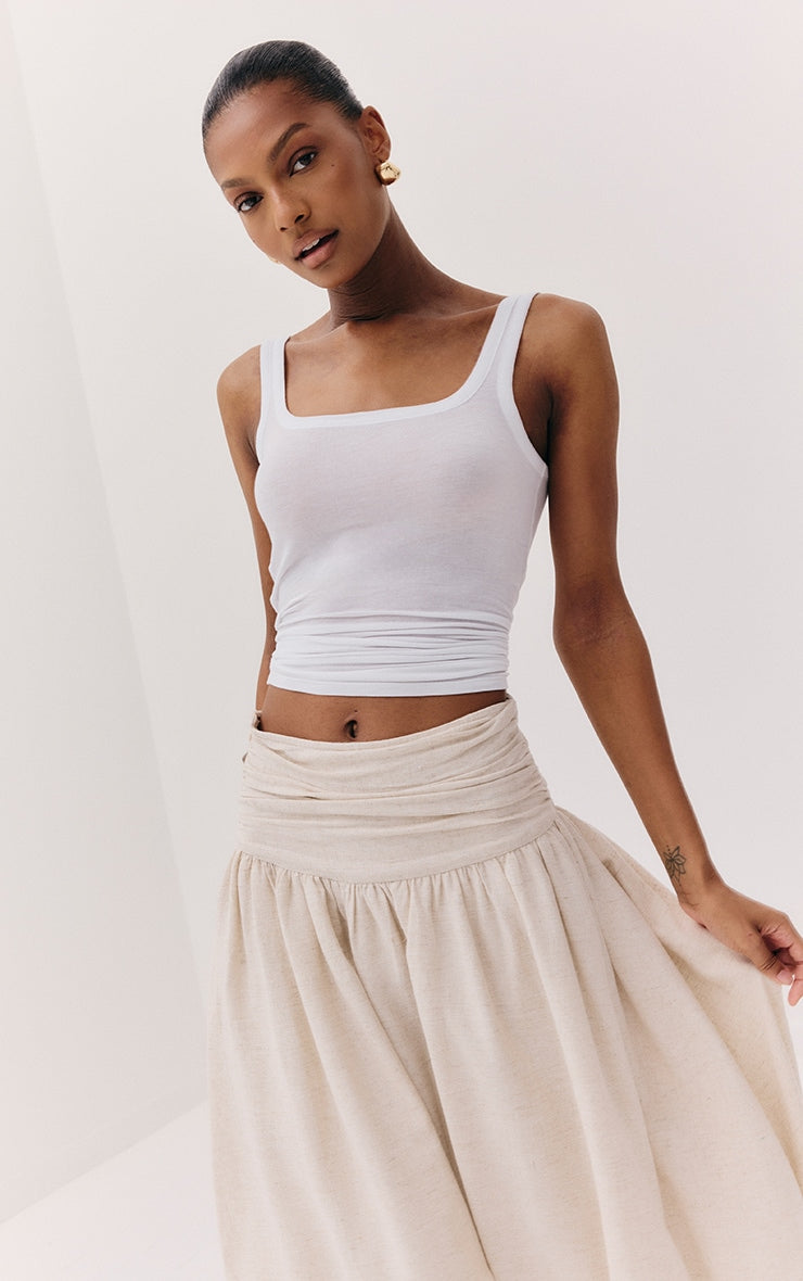 https://cdn-img.prettylittlething.com/e/7/8/a/e78a10bac6bc9455b93daa074adfdb32bc110aa5_CNM3751_1_white_sheer_soft_touch_scoop_neck_long_vest_top.jpg
