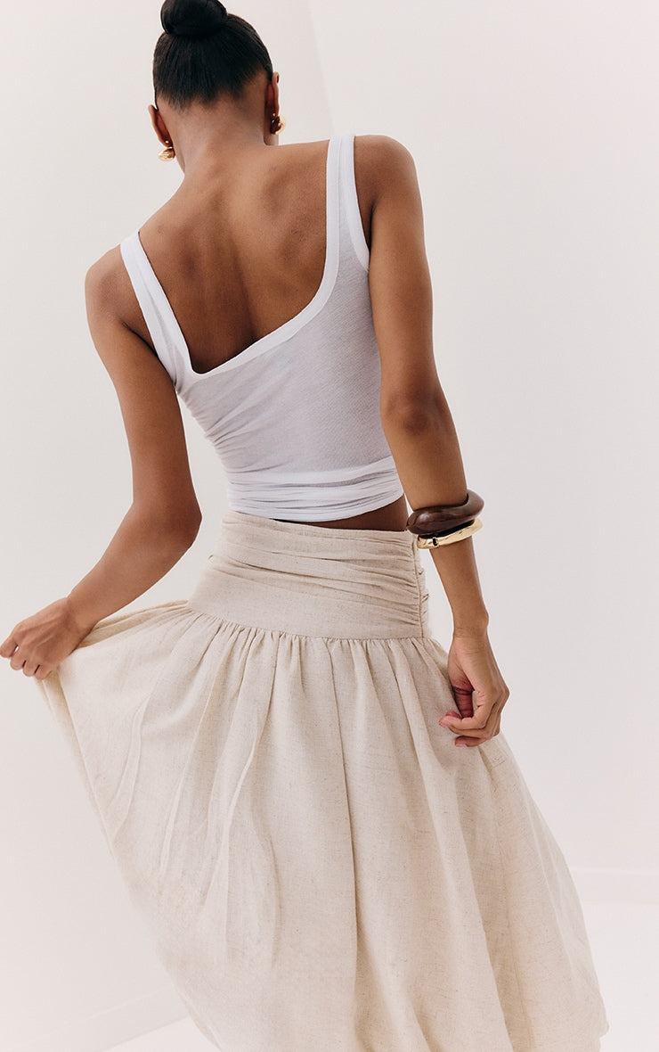 https://cdn-img.prettylittlething.com/f/2/3/e/f23e89663fdc9426621a456b528d1fd4d9ddb8d2_CNM3751_2_white_sheer_soft_touch_scoop_neck_long_vest_top.jpg