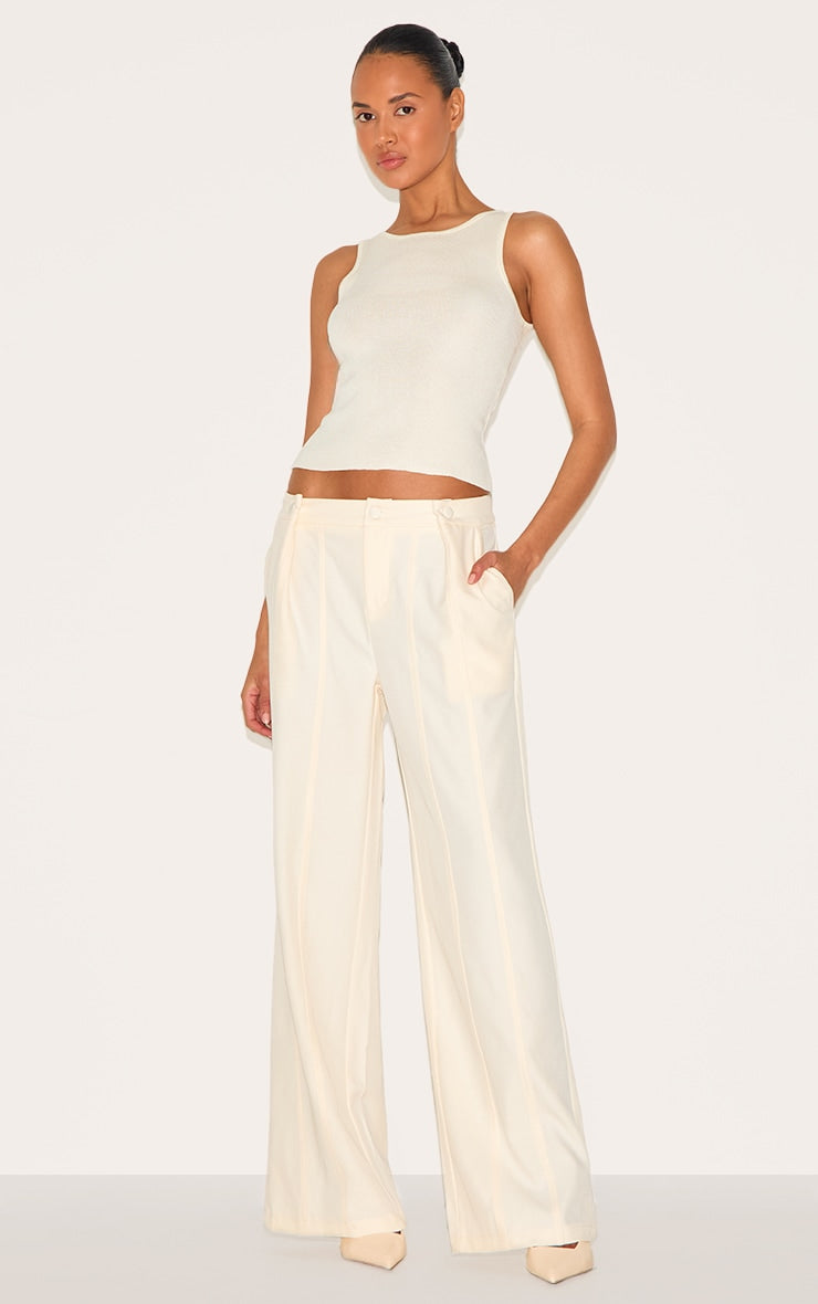 https://cdn-img.prettylittlething.com/f/8/7/7/f87742dc6e55efcd8378ebdf3c3da0f69e3ea32b_CNL6071_7_cream_fine_knit_racer_neck_top.jpg