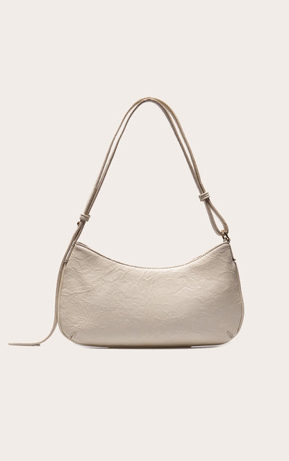 https://cdn-img.prettylittlething.com/f/b/1/7/fb17ef1b3c2293b09288e8448fbbb37bf51dfabf_CNL7999_3_cream_textured_pu_baguette_shoulder_bag.jpg